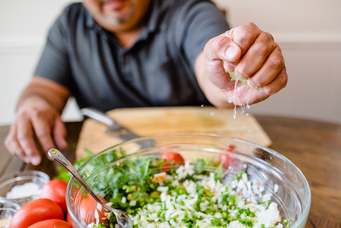 Active man preparing nutritious meal